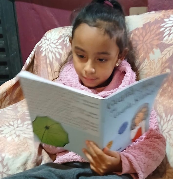Foto de um leitor do livro Guarda-chuva ou guarda sonhos?